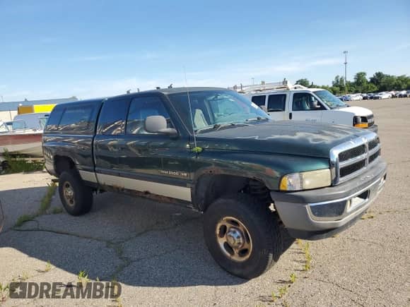 2002 Dodge 2500 with VIN 3B7KF23Z32M247123, listed as a Copart auction lot 65627935 with 181,273 mi miles and Clean title. Bid and sale history available at DreamBid. Image 4.