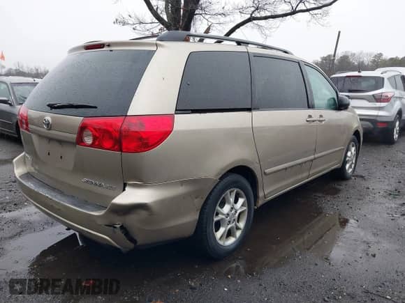 2006 Toyota Sienna XLE with VIN 5TDZA22C66S537484, listed as a IAAI auction lot 41778170 with 209,579 mi miles and . Bid and sale history available at DreamBid. Image 4.