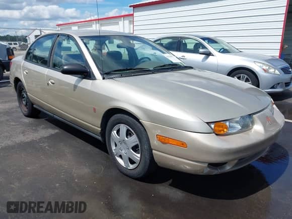 2002 Saturn SL с VIN 1G8ZK52712Z234021, выставлен на аукционе IAAI как лот 43119833 с пробегом 292 780 миль миль и . История ставок и продаж доступна на DreamBid. Изображение 1.