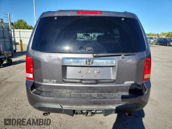 2014 Honda Pilot EX-L z VIN 5FNYF4H55EB054900, wystawiony jako Copart lot #82346645 z przebiegiem 158 454 mil mil oraz Szkoda całkowita • Salvage title. Historia ofert i sprzedaży dostępna na DreamBid. Obrazek 6.