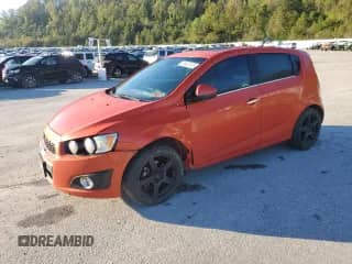 2012 Chevrolet Sonic LTZ z VIN 1G1JF6SB0C4169672, wystawiony jako Copart lot #85825135 z przebiegiem 216 347 mil mil oraz Szkoda całkowita • Salvage title. Historia ofert i sprzedaży dostępna na DreamBid. Obrazek 1.