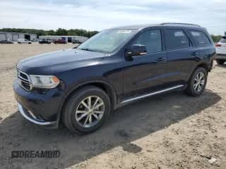 2014 Dodge Durango Limited with VIN 1C4RDHDG2EC593545, listed as a Copart auction lot 69994475 with 104,453 mi miles and Salvage title. Bid and sale history available at DreamBid. Image 1.
