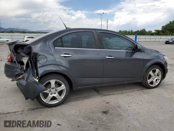 2013 Chevrolet Sonic LTZ с VIN 1G1JE5SH0D4102525, выставлен на аукционе Copart как лот 60976595 с пробегом 138 420 миль миль и Списание • Salvage title. История ставок и продаж доступна на DreamBid. Изображение 3.