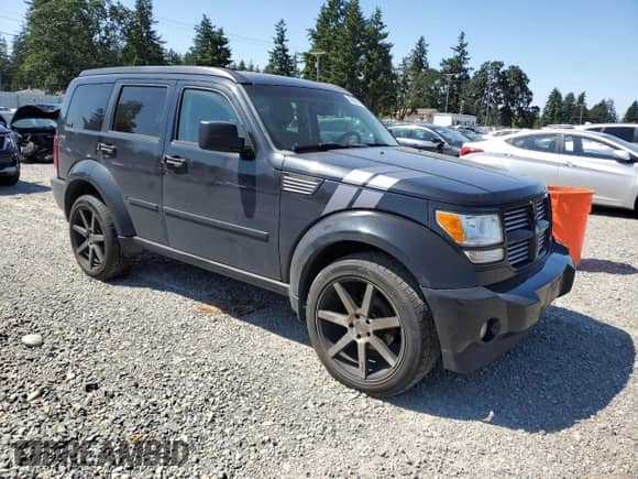 2011 Dodge Nitro Shock с VIN 1D4PU7GXXBW544068, выставлен на аукционе Copart как лот 59348155 с пробегом 247 325 миль миль и Списание • Salvage title. История ставок и продаж доступна на DreamBid. Изображение 4.