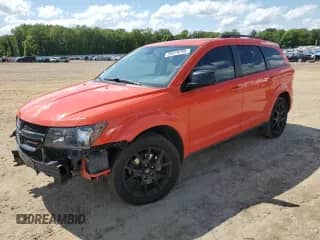 2018 Dodge Journey SXT z VIN 3C4PDDBG0JT257801, wystawiony jako Copart lot #56919795 z przebiegiem 132 751 mil mil oraz Szkoda całkowita • Salvage title. Historia ofert i sprzedaży dostępna na DreamBid. Obrazek 1.