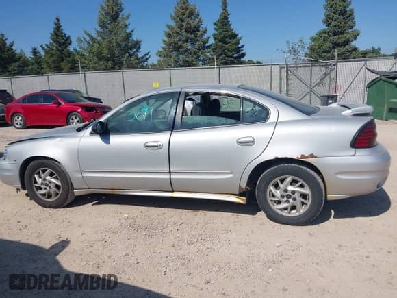 2004 Pontiac Grand Am SE1 with VIN 1G2NF52EX4C200337, listed as a IAAI auction lot 43313819 with Not provided miles and . Bid and sale history available at DreamBid. Image 13.