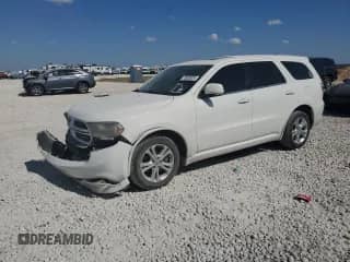 2012 Dodge Durango R/T with VIN 1C4SDHCT5CC301271, listed as a Copart auction lot 73953924 with 109,039 mi miles and Salvage title. Bid and sale history available at DreamBid. Image 1.