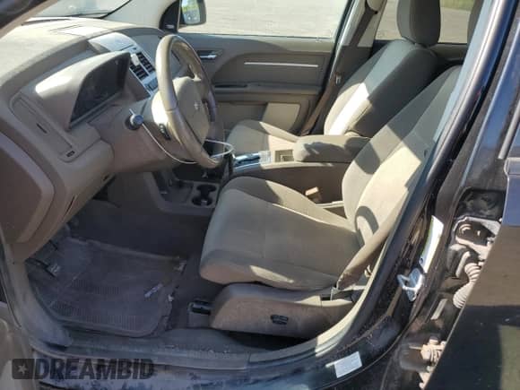 2009 Dodge Journey SXT with VIN 3D4GG57VX9T217437, listed as a Copart auction lot 80290665 with 197,865 mi miles and Salvage title. Bid and sale history available at DreamBid. Image 7.