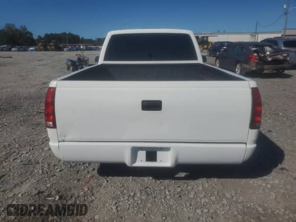 1990 Chevrolet Silverado 1500 с VIN 1GCDC14K6LZ258064, выставлен на аукционе Copart как лот 87400875 с пробегом 330 069 миль миль и Списание • Salvage title. История ставок и продаж доступна на DreamBid. Изображение 6.