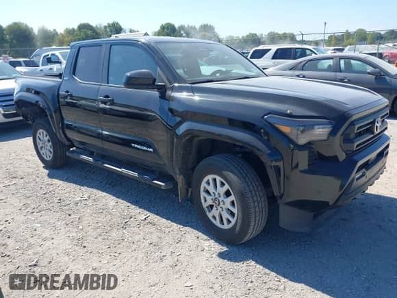 2024 Toyota Tacoma SR5 with VIN 3TMLB5JN4RM068147, listed as a IAAI auction lot 43177753 with 15,469 mi miles and . Bid and sale history available at DreamBid. Image 1.
