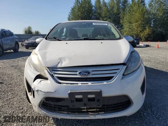2011 Ford Fiesta S с VIN 3FADP4AJ2BM168160, выставлен на аукционе Copart как лот 68500805 с пробегом 146 967 миль миль и Списание • Salvage title. История ставок и продаж доступна на DreamBid. Изображение 5.
