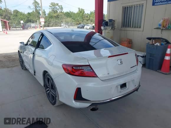 2017 Honda Accord Touring with VIN 1HGCT2B08HA001739, listed as a IAAI auction lot 41695237 with 117,828 mi miles and . Bid and sale history available at DreamBid. Image 3.
