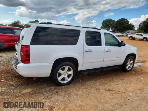 2008 Chevrolet Suburban LTZ with VIN 3GNFC16058G150599, listed as a Copart auction lot 84634985 with 240,831 mi miles and Salvage title. Bid and sale history available at DreamBid. Image 3.