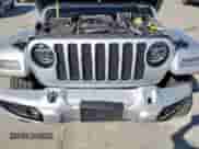 2022 Jeep Wrangler Unlimited Sahara Altitude with VIN 1C4HJXEN3NW261768, listed as a Copart auction lot 47054355 with 23,254 mi miles and Salvage title. Bid and sale history available at DreamBid. Image 11.