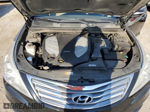 2013 Hyundai Azera с VIN KMHFG4JG0DA289384, выставлен на аукционе Copart как лот 70318184 с пробегом 122 843 миль миль и Списание • Salvage title. История ставок и продаж доступна на DreamBid. Изображение 11.