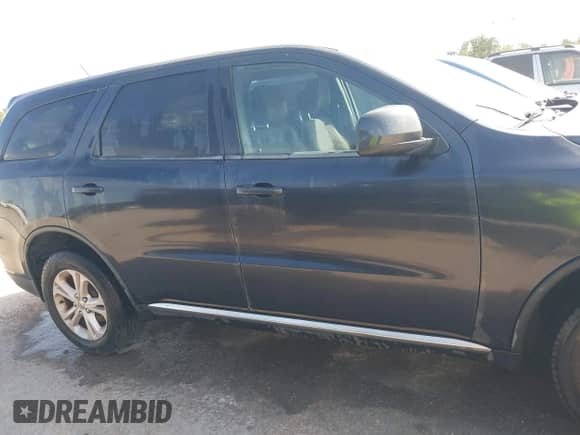 2013 Dodge Durango SXT with VIN 1C4RDHAG2DC699755, listed as a IAAI auction lot 43466489 with 156,941 mi miles and . Bid and sale history available at DreamBid. Image 13.