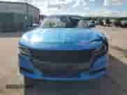 2015 Dodge Charger SXT with VIN 2C3CDXHG7FH738155, listed as a Copart auction lot 86615685 with 116,300 mi miles and Salvage title. Bid and sale history available at DreamBid. Image 5.
