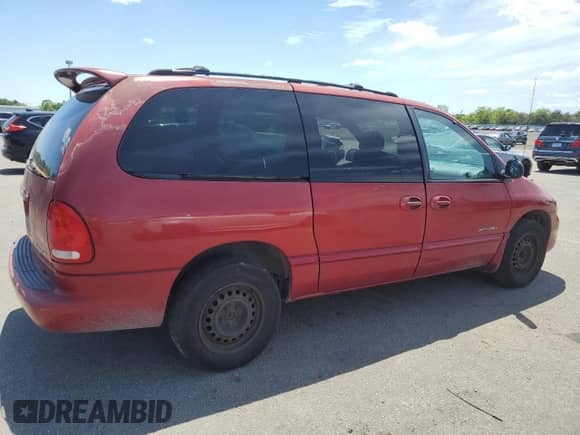 2000 Dodge Caravan SE с VIN 1B4GP44R7YB779226, выставлен на аукционе Copart как лот 56919784 с пробегом 202 679 миль миль и Списание • Salvage title. История ставок и продаж доступна на DreamBid. Изображение 3.