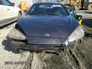 2008 Hyundai Tiburon GT с VIN KMHHN66F48U283697, выставлен на аукционе Copart как лот 85355614 с пробегом 220 427 миль миль и Списание • Salvage title. История ставок и продаж доступна на DreamBid. Изображение 5.