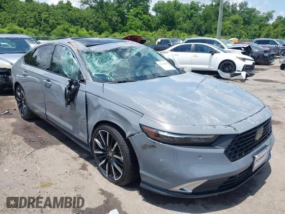2023 Honda Accord Touring z VIN 1HGCY2F86PA017857, wystawiony jako IAAI lot #42324010 z przebiegiem Nie podano mil oraz . Historia ofert i sprzedaży dostępna na DreamBid. Obrazek 1.
