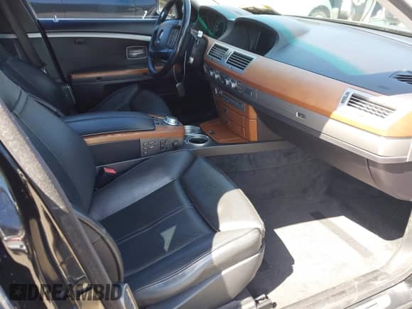 2006 BMW 7 Series 750i с VIN WBAHL83506DT06128, выставлен на аукционе IAAI как лот 42140953 с пробегом 143 833 миль миль и . История ставок и продаж доступна на DreamBid. Изображение 5.