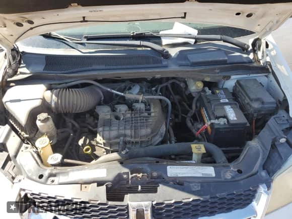 2011 Dodge Grand Caravan Express with VIN 2D4RN4DG2BR732018, listed as a Copart auction lot 69434575 with 140,233 mi miles and Salvage title. Bid and sale history available at DreamBid. Image 12.