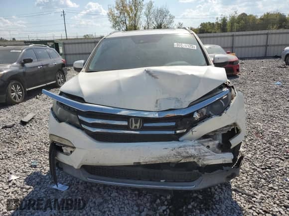 2016 Honda Pilot Elite с VIN 5FNYF6H03GB002006, выставлен на аукционе Copart как лот 80686125 с пробегом 165 695 миль миль и Списание • Salvage title. История ставок и продаж доступна на DreamBid. Изображение 5.