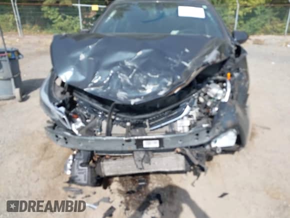 2018 Chevrolet Cruze LT z VIN 1G1BE5SM7J7197502, wystawiony jako IAAI lot #43222022 z przebiegiem 95 060 mil mil oraz . Historia ofert i sprzedaży dostępna na DreamBid. Obrazek 6.