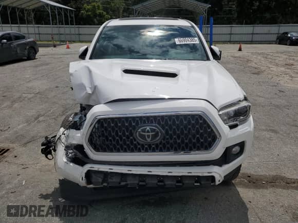 2018 Toyota Tacoma SR5 с VIN 3TMBZ5DN3JM016239, выставлен на аукционе Copart как лот 68904385 с пробегом 77 131 миль миль и Списание • Salvage title. История ставок и продаж доступна на DreamBid. Изображение 5.