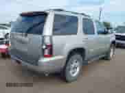 2007 Chevrolet Tahoe LTZ with VIN 1GNFK13027R341063, listed as a IAAI auction lot 43143783 with 273,637 mi miles and . Bid and sale history available at DreamBid. Image 4.