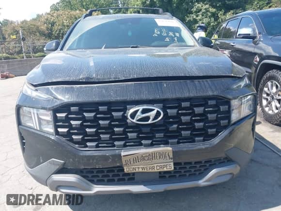 2023 Hyundai Santa Fe XRT with VIN 5NMS64AJ4PH490636, listed as a IAAI auction lot 43136441 with 82,841 mi miles and . Bid and sale history available at DreamBid. Image 12.