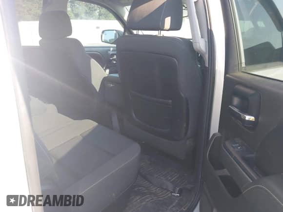 2014 Chevrolet Silverado 1500 LT with VIN 3GCPCREHXEG259073, listed as a IAAI auction lot 43010013 with 128,000 mi miles and . Bid and sale history available at DreamBid. Image 8.