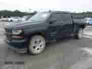 2018 Chevrolet Silverado 1500 Custom z VIN 1GCRCPEC0JZ356018, wystawiony jako IAAI lot #43425403 z przebiegiem 64 996 mil mil oraz . Historia ofert i sprzedaży dostępna na DreamBid. Obrazek 2.