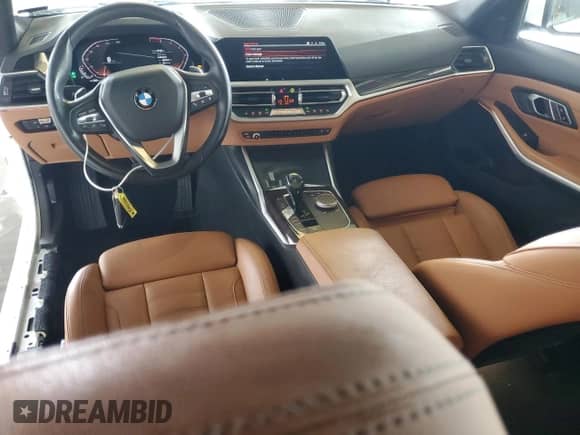 2019 BMW 3 Series 330i with VIN WBA5R1C54KAK12564, listed as a Copart auction lot 87452615 with 49,169 mi miles and Salvage title. Bid and sale history available at DreamBid. Image 8.