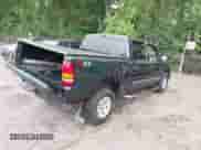 2005 GMC Sierra 1500 SLE with VIN 2GTEK13T751268325, listed as a IAAI auction lot 42517005 with 159,271 mi miles and . Bid and sale history available at DreamBid. Image 4.