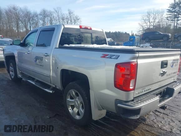 2018 Chevrolet Silverado 1500 LTZ z VIN 3GCUKSECXJG536316, wystawiony jako IAAI lot #41432469 z przebiegiem 127 276 mil mil oraz . Historia ofert i sprzedaży dostępna na DreamBid. Obrazek 3.