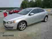 2015 Volvo S60 T5 Drive-E Premier with VIN YV140MFK9F2357136, listed as a Copart auction lot 80853495 with 106,284 mi miles and Salvage title. Bid and sale history available at DreamBid. Image 1.