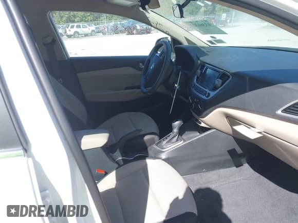 2022 Hyundai Accent SEL with VIN 3KPC24A6XNE180524, listed as a IAAI auction lot 43366323 with 20,918 mi miles and . Bid and sale history available at DreamBid. Image 5.