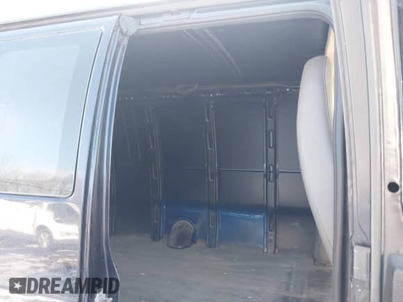 2014 Chevrolet Express Cargo with VIN 1GCWGGBA5E1205786, listed as a IAAI auction lot 41339085 with 201,460 mi miles and . Bid and sale history available at DreamBid. Image 8.