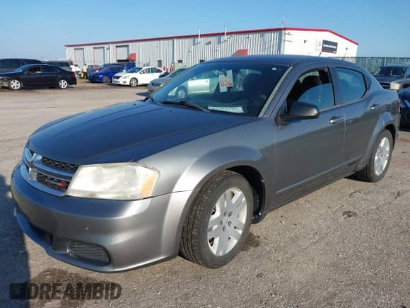 2013 Dodge Avenger SE with VIN 1C3CDZAB6DN590997, listed as a IAAI auction lot 43301503 with 176,151 mi miles and . Bid and sale history available at DreamBid. Image 2.