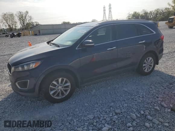 2016 Kia Sorento LX with VIN 5XYPG4A37GG157071, listed as a Copart auction lot 81704565 with 121,378 mi miles and Salvage title. Bid and sale history available at DreamBid. Image 1.