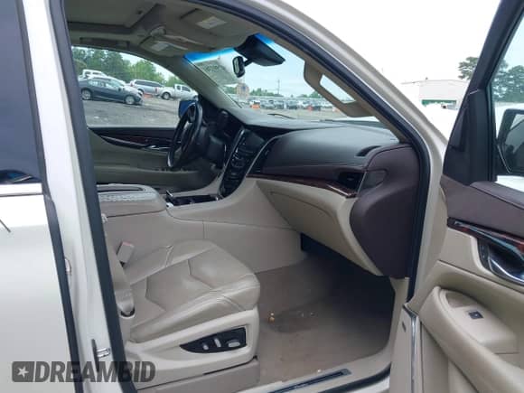 2015 Cadillac Escalade ESV Luxury with VIN 1GYS3HKJ0FR179756, listed as a IAAI auction lot 42597381 with 129,682 mi miles and . Bid and sale history available at DreamBid. Image 5.