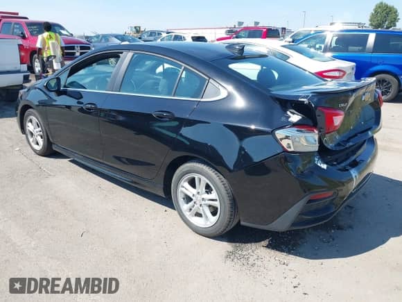 2018 Chevrolet Cruze LT with VIN 1G1BE5SM7J7210684, listed as a IAAI auction lot 43202728 with 152,658 mi miles and . Bid and sale history available at DreamBid. Image 3.