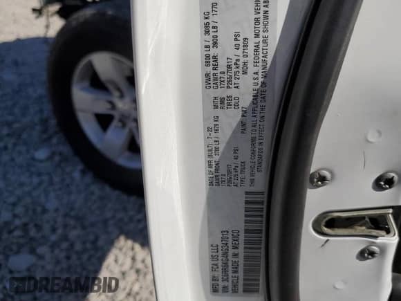 2022 Ram 1500 Tradesman z VIN 3C6RR6KG4NG347013, wystawiony jako Copart lot #66958075 z przebiegiem 64 323 mil mil oraz Szkoda całkowita • Salvage title. Historia ofert i sprzedaży dostępna na DreamBid. Obrazek 13.