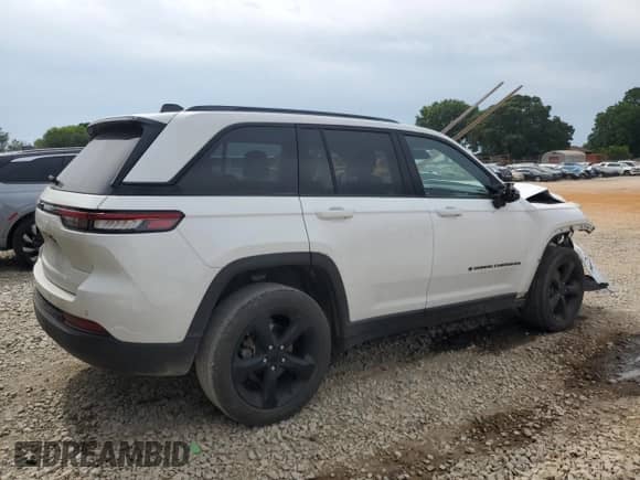2023 Jeep Grand Cherokee Altitude with VIN 1C4RJGAG6PC587354, listed as a Copart auction lot 62698805 with 84,492 mi miles and Salvage title. Bid and sale history available at DreamBid. Image 3.