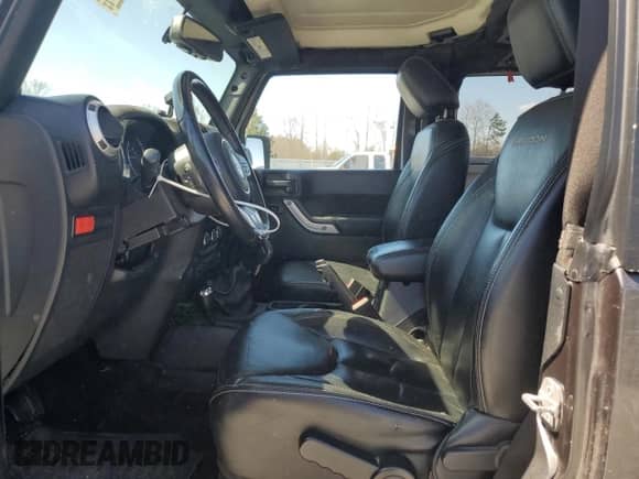 2014 Jeep Wrangler Rubicon with VIN 1C4BJWCG7EL256627, listed as a Copart auction lot 49608025 with 149,428 mi miles and Salvage title. Bid and sale history available at DreamBid. Image 7.