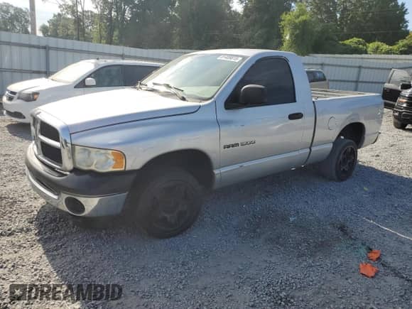 2003 Dodge 1500 ST with VIN 1D7HA16K23J602093, listed as a Copart auction lot 81409815 with 148,065 mi miles and Salvage title. Bid and sale history available at DreamBid. Image 1.