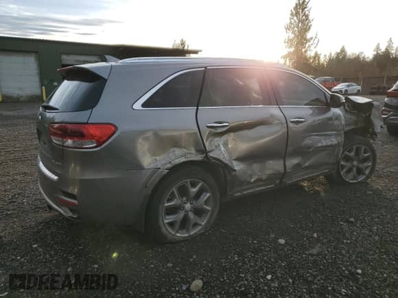 2016 Kia Sorento SXL with VIN 5XYPKDA16GG001293, listed as a Copart auction lot 85128944 with 121,180 mi miles and Salvage title. Bid and sale history available at DreamBid. Image 3.