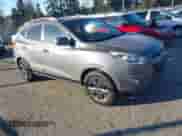2014 Hyundai Tucson Walking Dead Edition z VIN KM8JUCAG1EU808097, wystawiony jako IAAI lot #41436214 z przebiegiem 114 198 mil mil oraz . Historia ofert i sprzedaży dostępna na DreamBid. Obrazek 1.