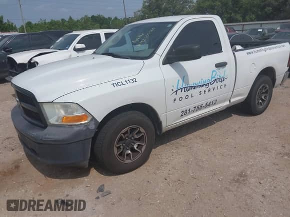 2012 Ram 1500 ST с VIN 3C6JD6AP2CG277134, выставлен на аукционе IAAI как лот 42305500 с пробегом 182 671 миль миль и . История ставок и продаж доступна на DreamBid. Изображение 2.